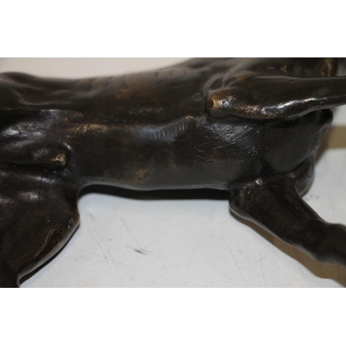 287 - Cast hollow patinated bronze model of a retriever, L25cm