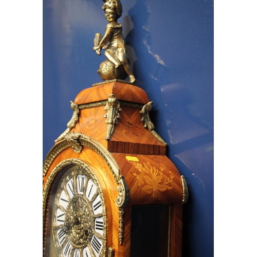 292 - French style brass bound marquetry inlaid column clock, the clock with brass dial having Roman numer... 