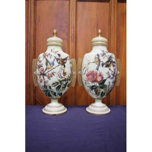 312 - Pair of Victorian opaline glass urns, c1880, the flattened ovoid bodies decorated in polychrome enam... 