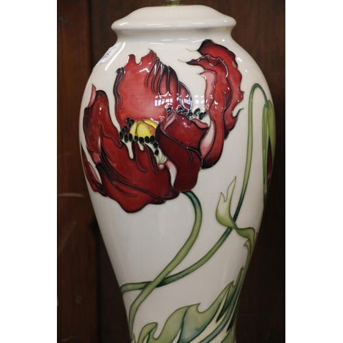 318 - Pair of Moorcroft pottery table lamps in the Dancing Flame pattern, max H48cm.