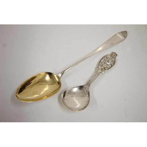 73 - Norwegian .830 standard silver serving spoon with silver gilt bowl and bright cut engraved handle, t... 