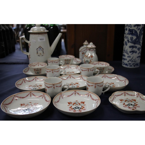 336 - Chinese export armorial porcelain part coffee and tea set, late 18th century, painted in puce and ir... 