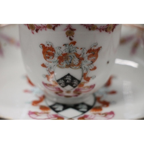 336 - Chinese export armorial porcelain part coffee and tea set, late 18th century, painted in puce and ir... 