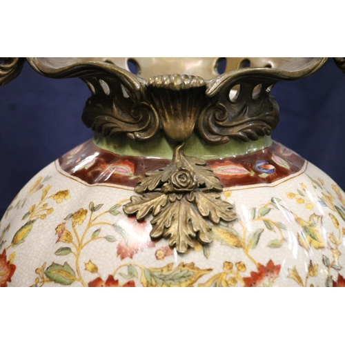 337 - Wong Lee floor vase, late 20th century, of baluster shape with polychrome foliate decoration on a cr... 