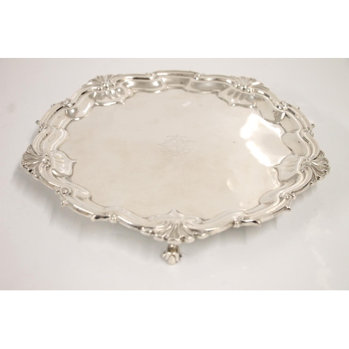 80B - Victorian silver salver, the shell and scroll cast border around a plain field with central engraved... 