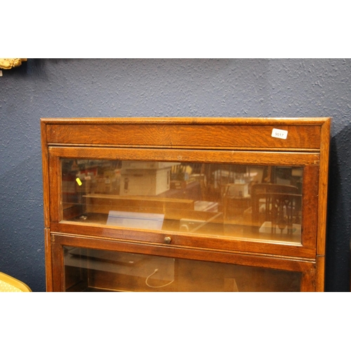 360 - 1920s Globe Wernicke style oak four sectional bookcase, H146cm.