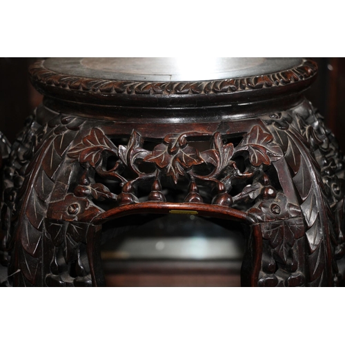 361 - Chinese hardwood jardiniere stand, late Qing period, the round top inset with variegated marble, ove... 