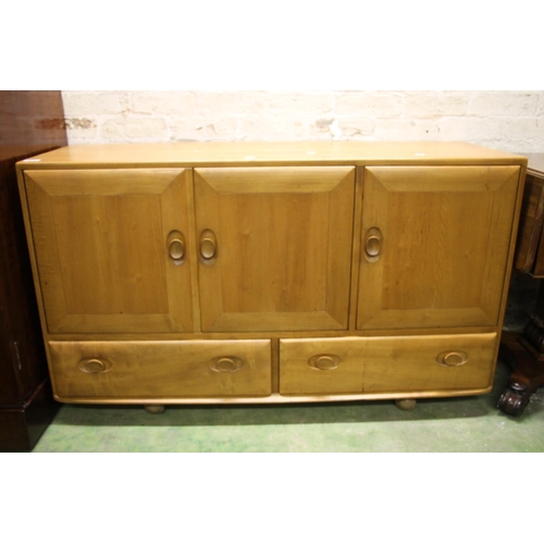 372 - Ercol Windsor model 468 elm sideboard, c1960s, having a twin door cupboard alongside a single door c... 