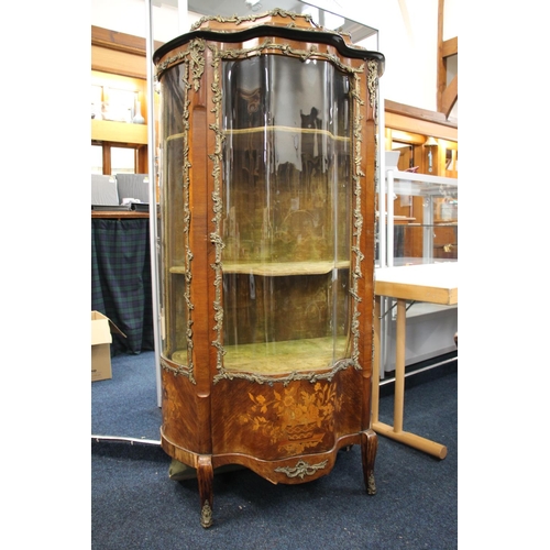 398 - A Victorian walnut, marquetry inlaid and gilt metal mounted vitrine of serpentine form, the single g... 