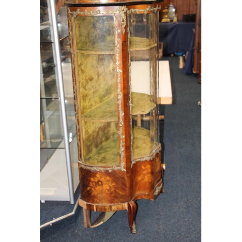 398 - A Victorian walnut, marquetry inlaid and gilt metal mounted vitrine of serpentine form, the single g... 