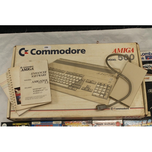 1198 - Commodore Amiga model 500 retro computer boxed with floppy disk drive and manuals, etc.