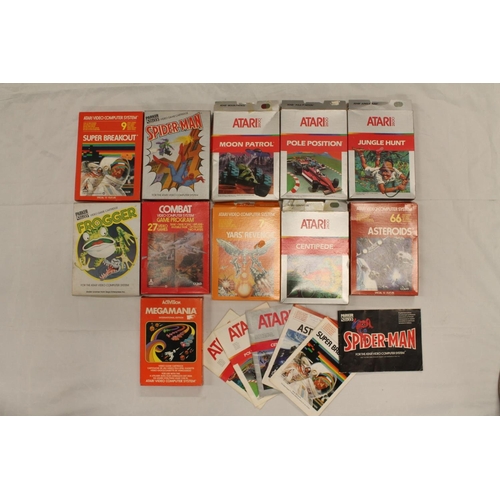 1205 - Atari boxed games to include Asteroids, Frogger, Spiderman, Jungle Hunt, etc some with instruction m... 