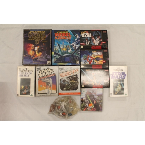 1207 - Box containing Star Wars memorabilia to include The Empire Strikes Back and Return of the Jedi Death... 