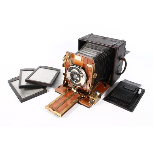 1252 - Plate camera The Sanderson with leather folding bellows and mahogany frame, having Koilos Patent Goe... 