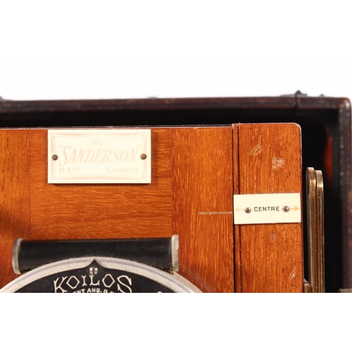 1252 - Plate camera The Sanderson with leather folding bellows and mahogany frame, having Koilos Patent Goe... 