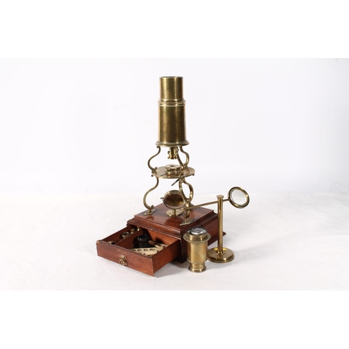 1253 - Harris & Son of London brass Culpeper type monocular microscope raised on stage with base drawer... 