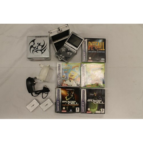 1215 - Gameboy Advance SP Limited Tribal Edition, plus Gameboy Advance games to include Splinter Cell, Pitf... 