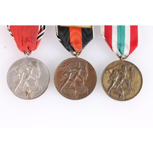 1435 - Nazi German WWII occupation medals to include Sudetenland Medal 1938 with Prague clasp, The Return o... 