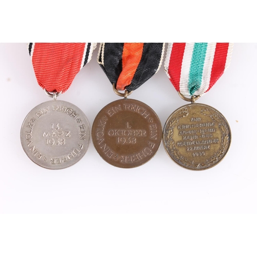 1435 - Nazi German WWII occupation medals to include Sudetenland Medal 1938 with Prague clasp, The Return o... 