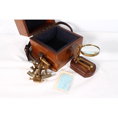 1257 - Stanley of London brass sextant stamped '1880', with magnification lens held in a velvet lined mahog... 