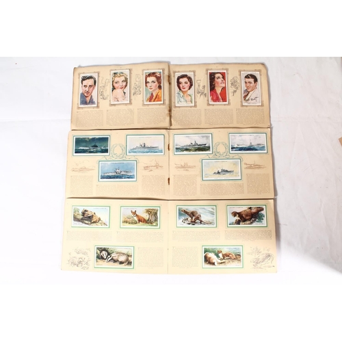 1273 - Vast collection of cigarette cards, probably 1000s, organised into packets by set but most seem to b... 