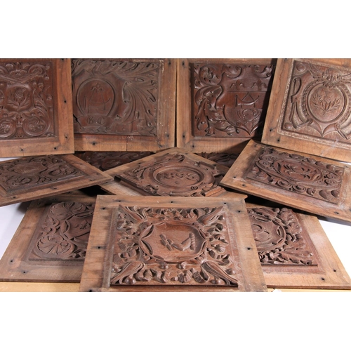 400A - Late Victorian carved oak heraldic plaques, max frame size 49cm x 34cm (12)