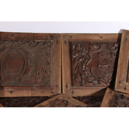 400A - Late Victorian carved oak heraldic plaques, max frame size 49cm x 34cm (12)