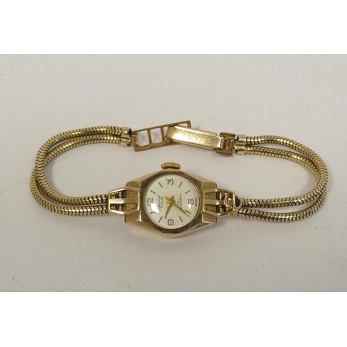 48 - Lady's Accurist 9ct gold watch, on snake double bracelet, nett 10.4g