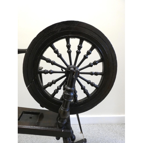 360 - Antique stained oak Scottish spinning wheel, with balustrade columns to the wheel, on turned column ... 