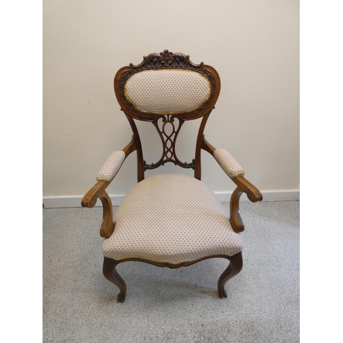 361 - French style walnut open ladies parlour armchair, with applied scroll decoration, on cabriole suppor... 