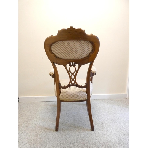 361 - French style walnut open ladies parlour armchair, with applied scroll decoration, on cabriole suppor... 