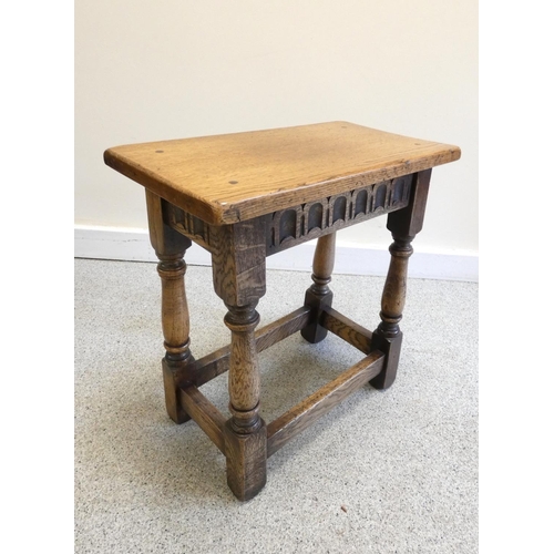 364 - 18th century style oak peg jointed stool, with rectangular top above incised geometric frieze, on tu... 