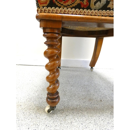 366 - Victorian walnut side chair with original needlepoint stuffover back rest and seat, on barley column... 