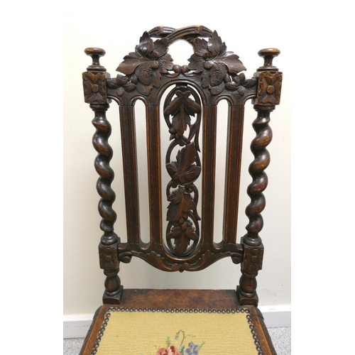 370 - Five matching Jacobean style dining chairs, with fruit and vine carvings on barley column supports a... 