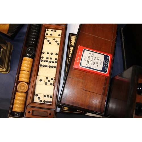 295 - Victorian rosewood games compendium, the hinged lid opening to reveal inset red and black leather pl... 