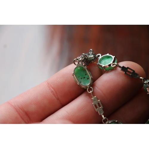 170 - Chinese 9ct white gold and carved and pierced jade bracelet, 8.9g gross and a similar dress ring, si... 