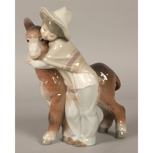 209 - Lladro figure boy with donkey 20cm.