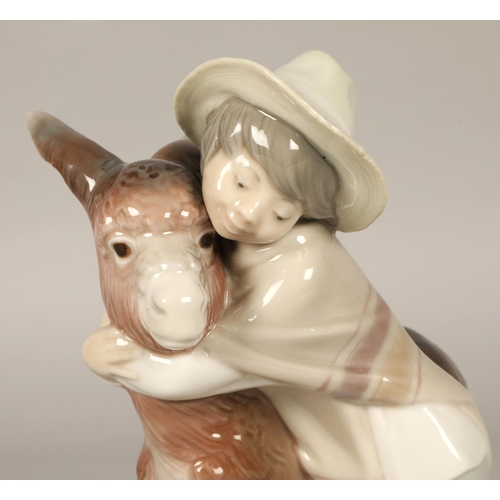 209 - Lladro figure boy with donkey 20cm.