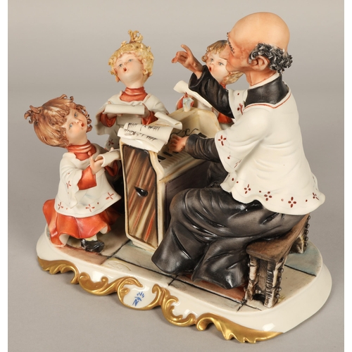 214 - Capodimonte figure group depicting a choir master and five choristers (6)