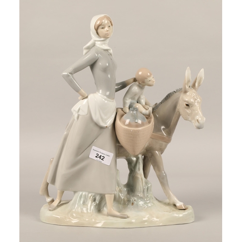 242 - Large Lladro figure of a mother and child with donkey