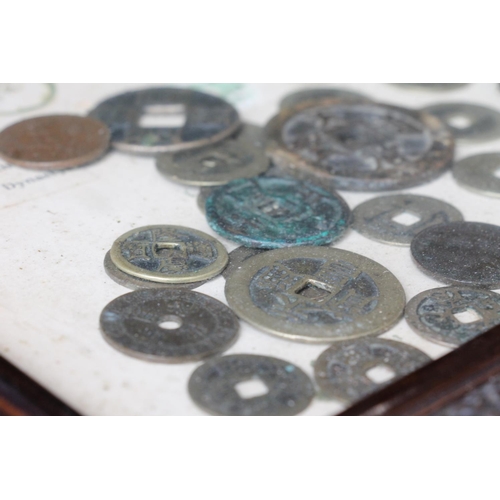 1368 - CHINA, a framed display of coins titled 'Chinese Coins' to include groups of cash coins purporting t... 