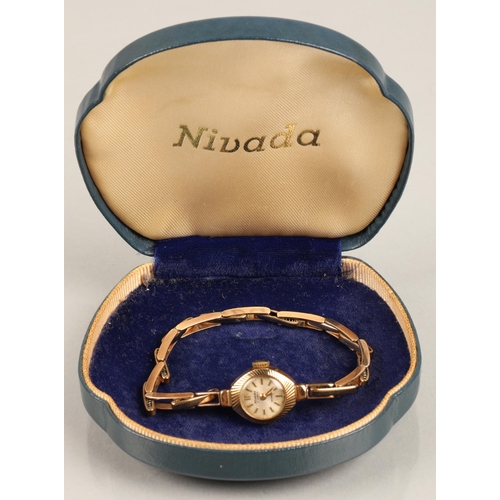 119 - Nivada 9ct gold wristwatch with case