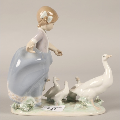 221 - Lladro figure of a girl with geese. 20cm