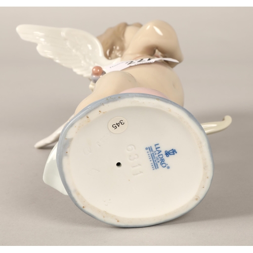 222 - Lladro figure of a winged cherub 20cm