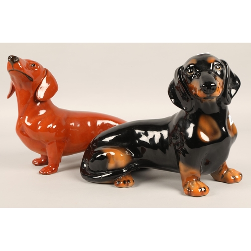 234 - Two large Beswick dachshund sausage dogs