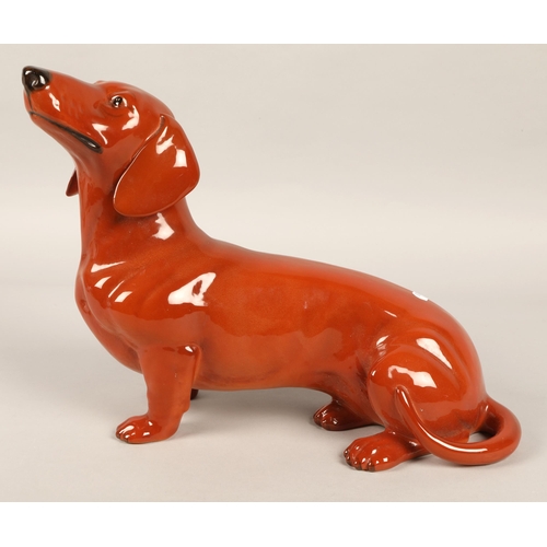 234 - Two large Beswick dachshund sausage dogs