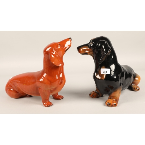 234 - Two large Beswick dachshund sausage dogs