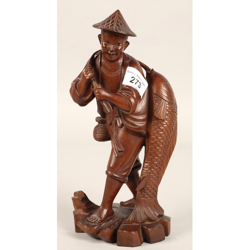 273 - Carved hardwood figure of a Chinese fisherman