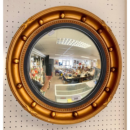 355 - Gilt convex circular mirror 42cm