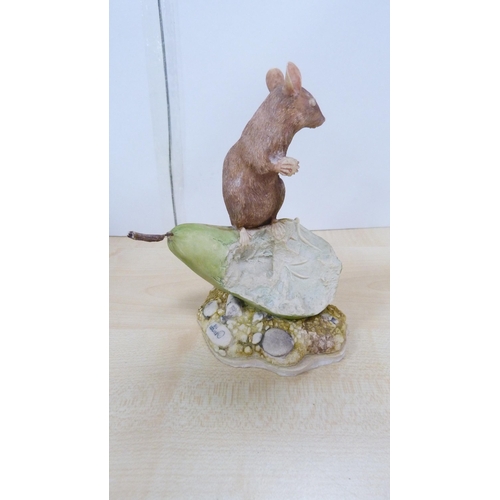 23 - Border Fine Arts figure of a mouse on a pear and three other animal figures.